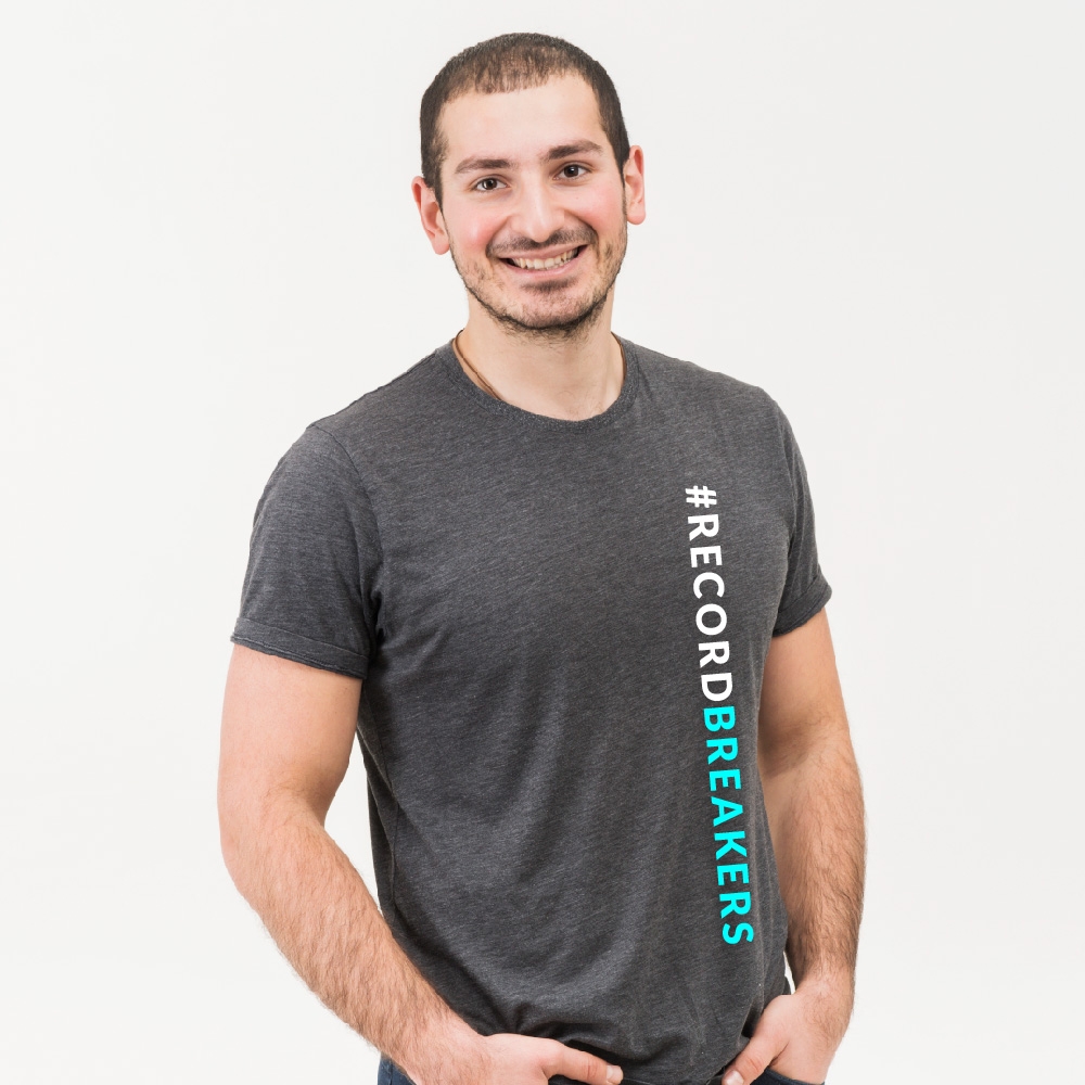 I need #RecordBreakers on the front of the shirt and Next UP logo on the back top of the shirt. logo design by AnuragYadav